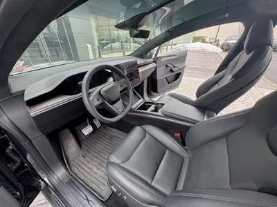 Driver cockpit — yoke wheel and 17″ touchscreen