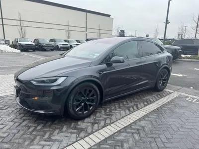 Front view — Tesla logo and LED headlights