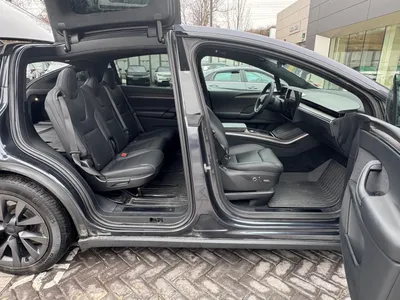 Interior view through open Falcon Wing doors