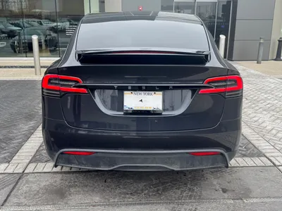 Rear view — TESLA lettering and taillights